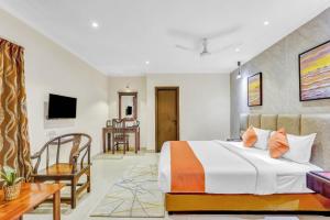 TV a/nebo společenská místnost v ubytování Blossoms Hotel & Service Apartments