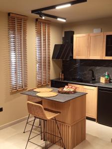 Kuchyň nebo kuchyňský kout v ubytování ''SteliosDimitra'' Guest House IV in Nafplio + 10 fotografií