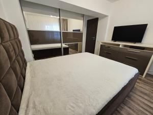 Ένα ή περισσότερα κρεβάτια σε δωμάτιο στο Carol Apart