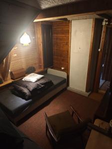 Postel nebo postele na pokoji v ubytování oBłędny Domek