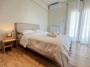 Ένα ή περισσότερα κρεβάτια σε δωμάτιο στο eLHria