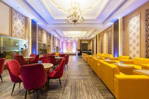 Posezení v ubytování Hotel Okas Grand