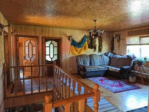 Χώρος καθιστικού στο Котедж У потічка