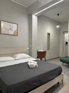 Postel nebo postele na pokoji v ubytování Charm Airport