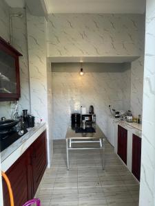 Η κουζίνα ή μικρή κουζίνα στο CHIGO safaris budget homes +13 φωτογραφίες