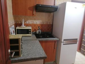 Η κουζίνα ή μικρή κουζίνα στο Oualidia résidence Ben zeroual