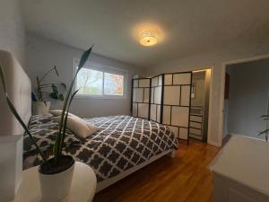 Voodi või voodid majutusasutuse Escapade familiale à Longueuil toas