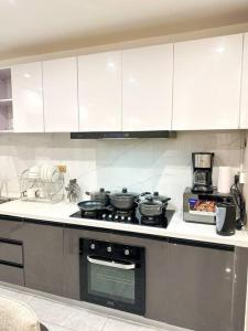 Η κουζίνα ή μικρή κουζίνα στο Nandwa ivy C507