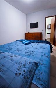 Postel nebo postele na pokoji v ubytování Aconchego na Chapada + 12 fotografií