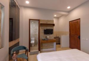 Μια τηλεόραση ή/και κέντρο ψυχαγωγίας στο The Boho Stays Dharamshala