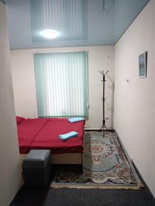 Ένα ή περισσότερα κρεβάτια σε δωμάτιο στο Favourite place +1 φωτογραφίες