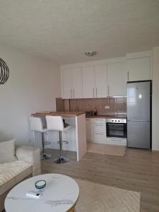 Η κουζίνα ή μικρή κουζίνα στο Apartman na dan Brcko