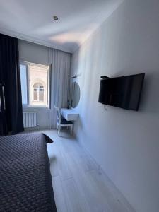 Μια τηλεόραση ή/και κέντρο ψυχαγωγίας στο Apartament Kobuleti