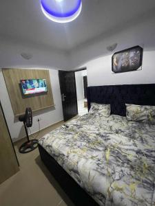 Ένα ή περισσότερα κρεβάτια σε δωμάτιο στο EXCLUSIVE Suite