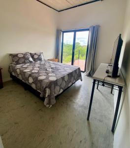 Postel nebo postele na pokoji v ubytování Monte Adentro