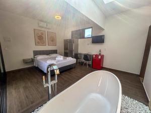 TV a/nebo společenská místnost v ubytování Vila das Aguas Ilhabela