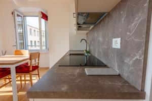 Kuchyň nebo kuchyňský kout v ubytování Casa Lumière