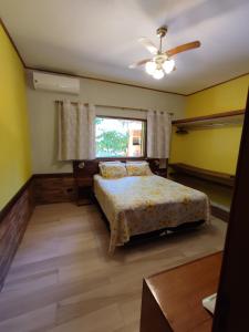 En eller flere senge i et værelse på Recanto das Águas