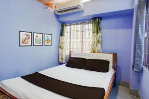 Postel nebo postele na pokoji v ubytování Hotel O Dream Lodge