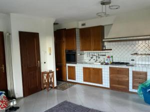 Køkken eller tekøkken på Rustico Villa Antonia with seaview and pool