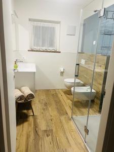 Koupelna v ubytování CORTE dei SANTI suite + 14 fotografií