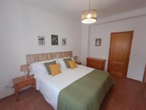 Postel nebo postele na pokoji v ubytování Casa Caldereta