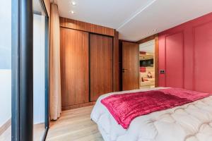 Postel nebo postele na pokoji v ubytování Luxury Suite des Princesses