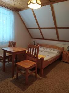 Postel nebo postele na pokoji v ubytování Domček JARKA