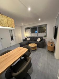 Χώρος καθιστικού στο Ferienwohnung Eider