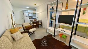 Et tv og/eller underholdning på Studio 150m do mar | Ar | Piscina | Aceita Pet