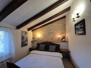 Postel nebo postele na pokoji v ubytování Casa Karnevali + 42 fotografií