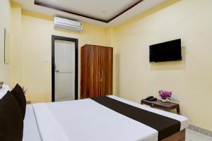 TV a/nebo společenská místnost v ubytování Collection O Asian Highway Near Agrasen Hospital Siliguri Formerly Ashiyana Homestay + 22 fotografií