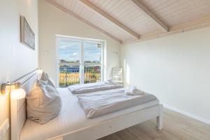 Ένα ή περισσότερα κρεβάτια σε δωμάτιο στο Krabbenfischer