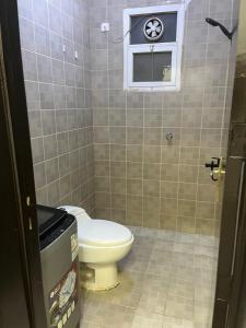 Et badeværelse på شقة فاخرة غرفة ماستر مع صالة