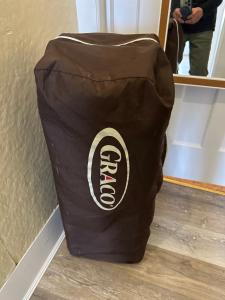 a bag sitting on the floor in front of a mirror at Sweet Home Alert Bay in Alert Bay +17 photos