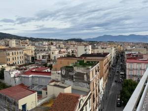 an aerial view of a city with buildings at Panoramic Tower in Torre del Greco