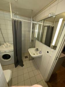 Koupelna v ubytování Cozy and modern apartment in the heart of OSLO