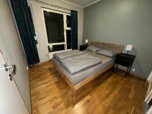 Postel nebo postele na pokoji v ubytování Cozy and modern apartment in the heart of OSLO