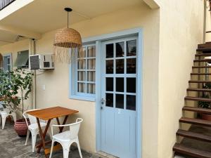 TV a/nebo společenská místnost v ubytování Vila Saruê