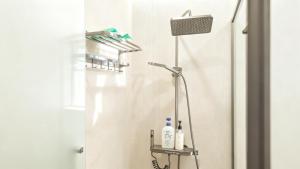 Ένα μπάνιο στο 琶心酒店公寓 Pace Hotel Apartment- Pazhou Station -Line8 and Line11 - few minutes' walk to Canton Exhibition Center +23 φωτογραφίες