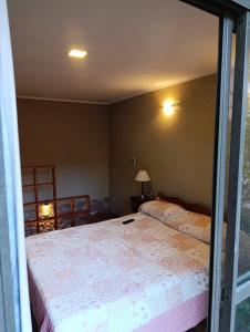 Ένα ή περισσότερα κρεβάτια σε δωμάτιο στο El sauce solo familia