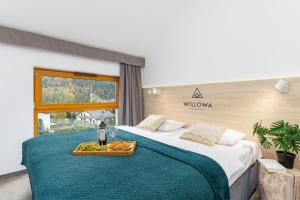 Postel nebo postele na pokoji v ubytování Apartamenty Willowa + 142 fotografií