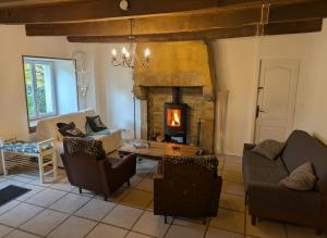 Χώρος καθιστικού στο Gîte de la Petite Ferme Bretonne