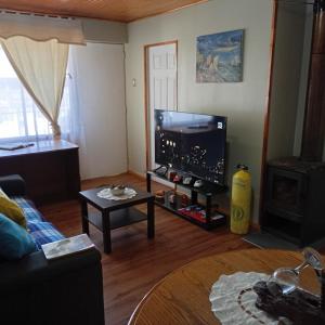 TV a/nebo společenská místnost v ubytování Alojamiento Monitor Huáscar