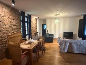 TV a/nebo společenská místnost v ubytování Alte Kammfabrik OG