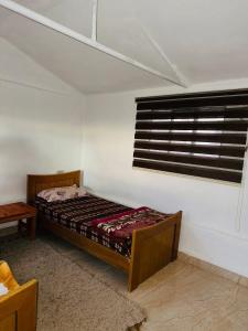 Ένα ή περισσότερα κρεβάτια σε δωμάτιο στο Alnwatif Gate guest house