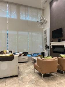 Televiisor ja/või meelelahutuskeskus majutusasutuses Villa Catali