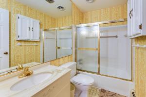 a bathroom with a toilet and a shower and a sink at 2 Mi to APG Edgewood Family Home with Fenced Yard in Edgewood +16 photos