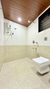 Koupelna v ubytování Swara Homestay + 7 fotografií