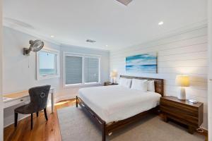 Ένα ή περισσότερα κρεβάτια σε δωμάτιο στο DS1113: 1113 Duneside Drive